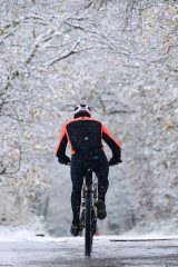 A cyclist out in the snow in Honley, Holmfirth.